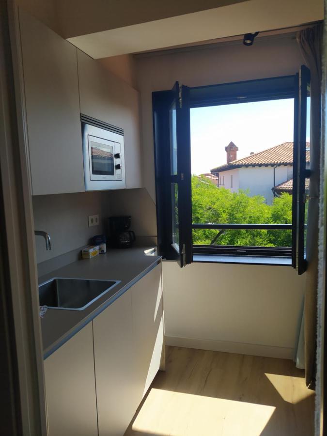 Apartamentos Puerta De Llanes Exteriör bild